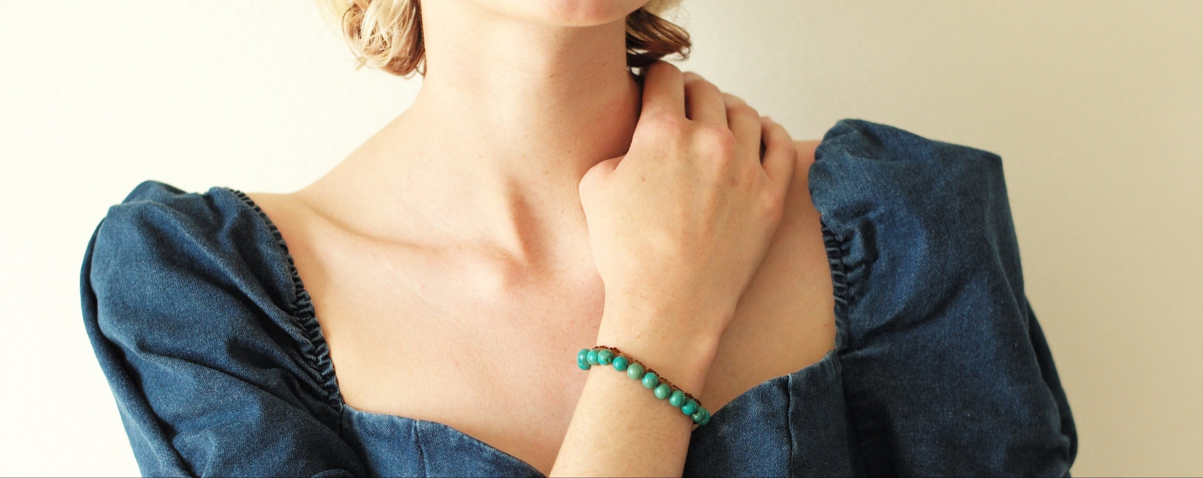 Model with turquoise bracelet